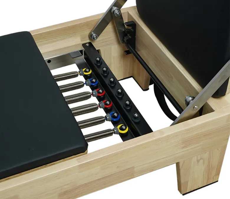 Pat Reformer din stejar cu bară de picioare integrată