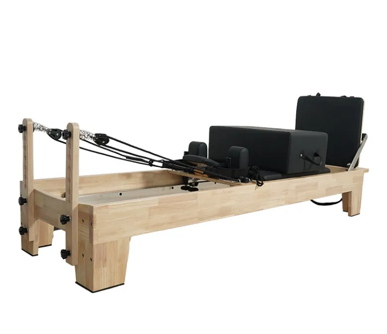 Pat Reformer din stejar cu bară de picioare integrată